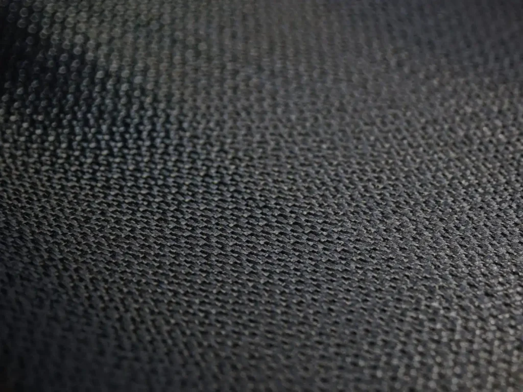 Carbon fiber is a lightweight, ultra-strong material used in high-performance bikes, offering exceptional strength-to-weight ratio and durability.